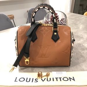 Brand new SOLDOUT LOUIS VUITTON SPEEDY 25 Bandouliere wild at heart Empreinte